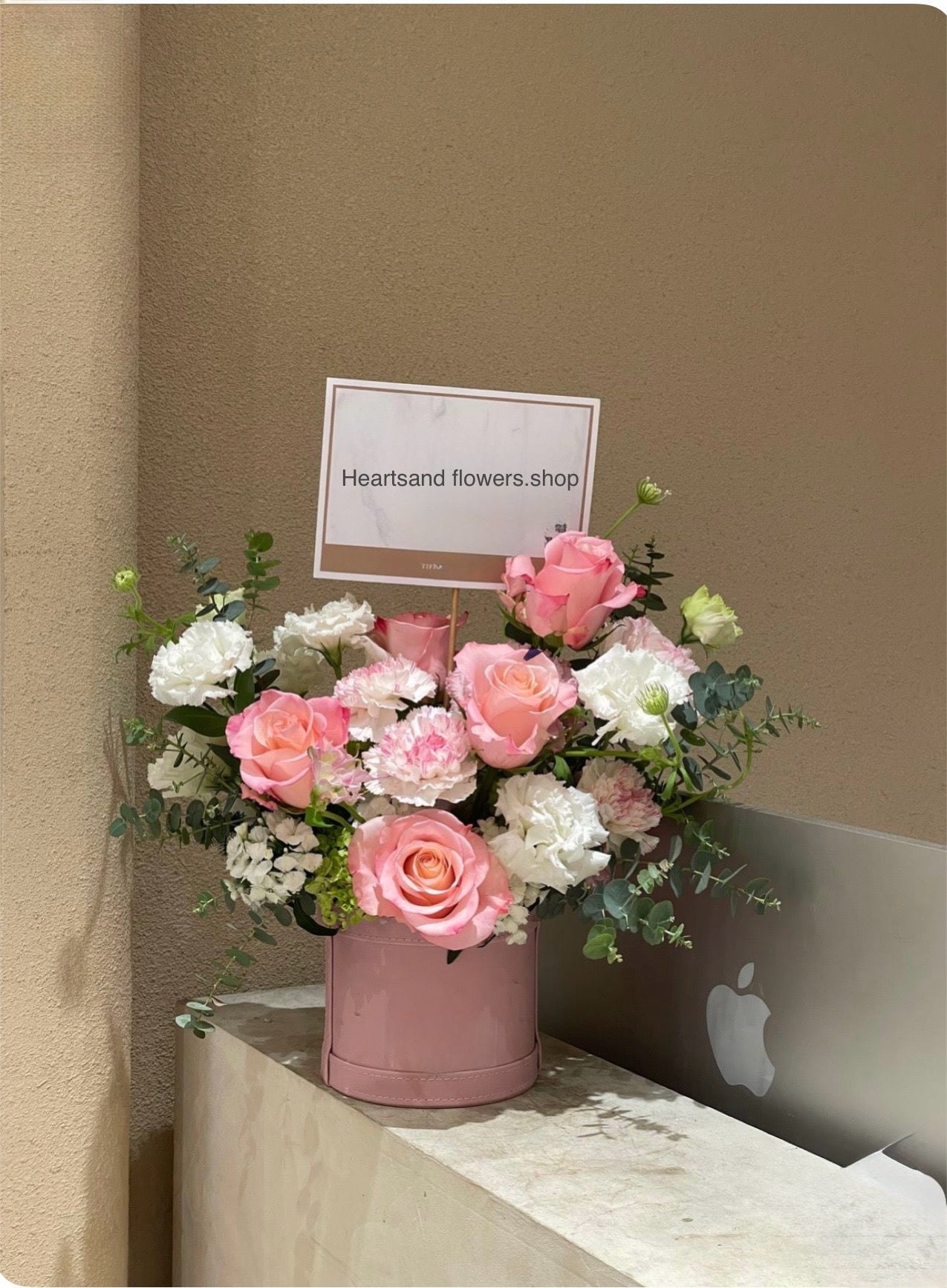 collection of seasonal flowers in a box